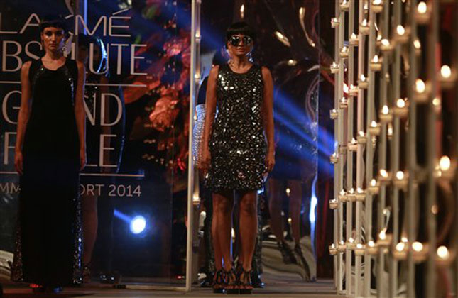 Models display creations a creation by Rajesh Pratap Singh during the Lakme Fashion Week. (AP Photo)