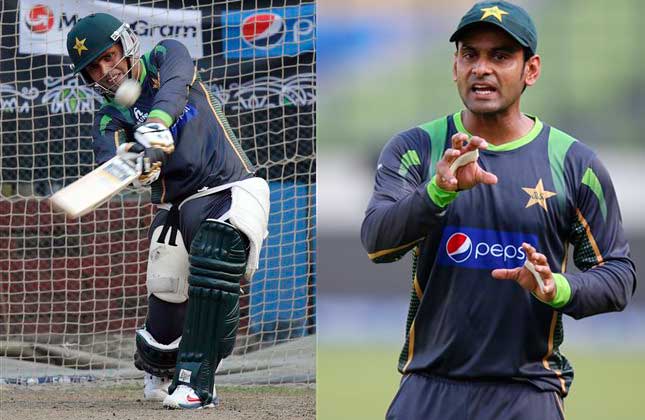 Pakistan's Kamran Akmal bats in the nets during a training session ahead of their ICC Twenty20 Cricket World Cup match against India in Dhaka, Bangladesh.Pakistan's captain Mohammad Hafeez talks to a member of team's support staff during a training session. (AP Photo)