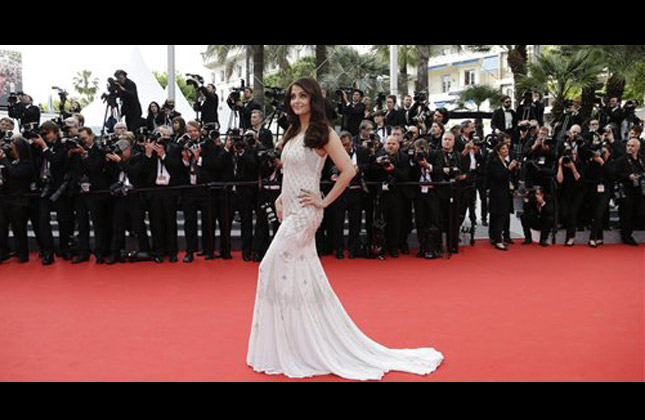 Actress Aishwarya Rai Bachchan poses for photographers as she arrives for the screening of The Search at the 67th international film festival, Cannes, southern France, Wednesday, May 21, 2014. (AP Photo)