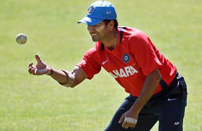 Indian cricketer Sachin Tendulkar prepares to catch a ball during a training session ahead of the ICC Cricket World Cup in Bangalore, India, Thursday, Feb. 10, 2011. Tendulkar heads into his record sixth cricket World Cup, a nation of 1.2 billion is hoping he can cap a phenomenal career with a win for host India. Tendulkar is the holder of virtually every major batting record in test and one day cricket, including most runs and most centuries in either form, and most believe a World Cup win will complete his career of achievements.(AP Photo/Aijaz Rahi)