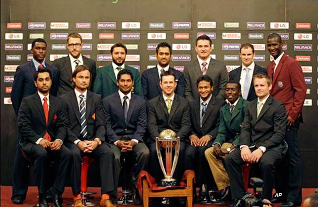 The 14 national captains , front l r, Canada's Ashish Bagai, Netherlands Peter Borren, Sri Lanka Kumar Sangakkara, Australia's Ricky Ponting, Bangladesh's Shakib Al Hasan, Kenya's Jimmy Kamande and Ireland William Porterfield, (Back Row L R) Zimbabwe's Elton Chigumbura, New Zealand's Daniel Vettori, Pakistan Shahid Afridi, India's Mahendra Singh Dhoni, South Africa's Graeme Smith, England's Andrew Strauss and West Indies Darren Sammy posing with the ICC Cricket World Cup trophy in Dhaka, Bangladesh on Thursday Feb. 17, 2011. The opening ceremony for the tornament starts later Thursday. (AP Photo/ Themba Hadebe)