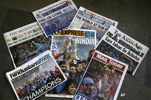 Indian newspaper front pages, the day after India won the Cricket World Cup in New Delhi, India, Sunday, April 3, 2011. India beat Sri Lanka to win the World Cup for the first time in 28 years, with skipper Mahendra Singh Dhoni guiding the run chase Saturday to deliver the great Sachin Tendulkar his first title in six attempts.(AP Photo)