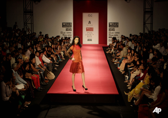 A model displays creations by Indian designer Ritu Kumar during the Wills Lifestyle India Fashion Week, in New Delhi, India, Thursday, April 7, 2011. (AP Photo/Manish Swarup)