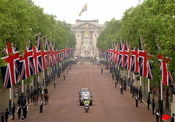 In this image taken from video, the car containing Britain's Prince William and Britain's Prince Harry drives down the Mall on it's way to Westminster Abbey for the Royal Wedding in London on Friday, April, 29, 2011. (AP Photo/APTN)