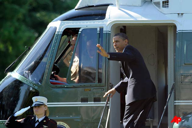 President Barack Obama waves from Marine One on the South Lawn of the White House in Washington, Thursday, May 5, 2011, as he departs for New York City to lay a wreath at Ground Zero. (AP Photo/Susan Walsh)