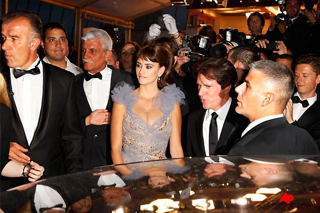 Actress Penelope Cruz, centre left, and director Rob Marshall, centre right, leave after the screening of Pirates of the Caribbean On Stranger Tidesat the 64th international film festival, in Cannes, southern France, Saturday, May 14, 2011. (AP Photo/Francois Mori)