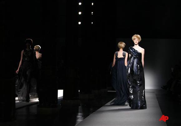 Models wear creations by Christophe Josse for the Fall Winter 2011 2012 Haute Couture fashion collection presented in Paris, Monday, July 4, 2011. (AP Photo/Francois Mori)