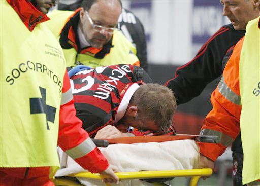 AC Milan English soccer star David Beckham reacts after being injured during the Serie A soccer match between AC Milan and Chievo at the San Siro stadium in Milan, Italy, Sunday, March 14, 2010. Beckham hobbled off with an apparent left leg injury in the closing minutes of AC Milan's game with Chievo Verona. (AP Photo/Antonio Calanni)