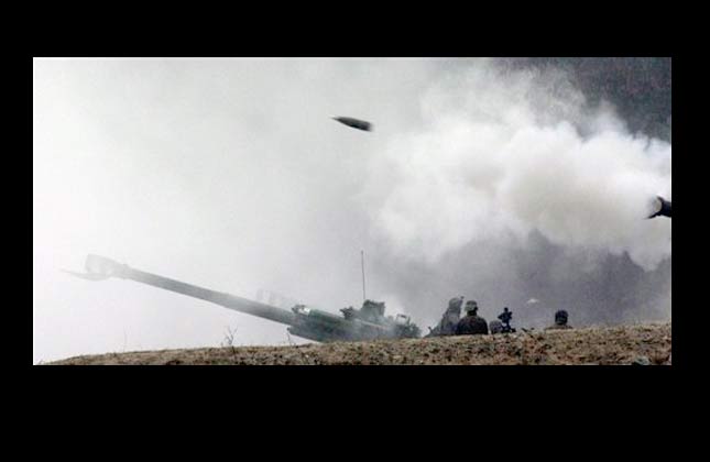 A rocket is fired from an M777 155mm Howitzer of the U.S. Marines from the 1st Marine Division, 11th Marines, Camp Pendleton, California, during the annual joint military exercises, dubbed Key Resolve and Foal Eagle, between the United States and South Korea, at the U.S. Army's Rodriguez Range in Pocheon, north of Seoul, South Korea, Monday, March 15, 2010. (AP Photo/ Lee Jin man)