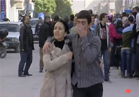 Residents take to the streets after a earthquake in Van eastern Turkey in this image taken from Sunday Oct. 23, 2011. A powerful earthquake struck eastern Turkey Sunday, collapsing at least two buildings in the center of eastern city of Van, the mayor said. (AP Photo/Anatolian TV. via APTN) TURKEY OUT TV OUT