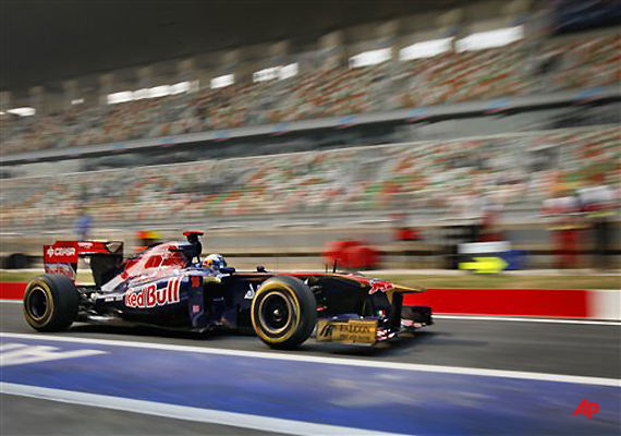 Toro Rosso driver Sebastien Buemi of Switzerland leaves the pit during the first free practice session ahead of Sunday's Indian Formula One Grand Prix at the Buddh International Circuit in Noida, 38 kilometers (24 miles) from New Delhi, India, Friday, Oct. 28, 2011. (AP Photo/Gurinder Osan)