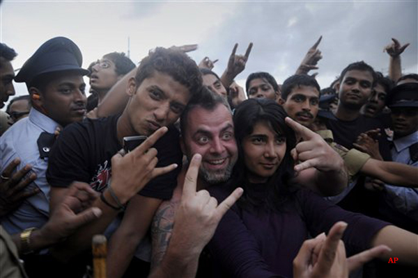 Indian fans reacts during the concert of U.S. heavy metal band Metallica, in Bangalore, India, Sunday, Oct. 30, 2011. (AP Photo/ Gireesh G.V)