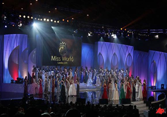 Contestants stand on stage at the 60th Miss World competition at Earls Court in London, Sunday, Nov. 6, 2011. (AP Photo/Kirsty Wigglesworth)