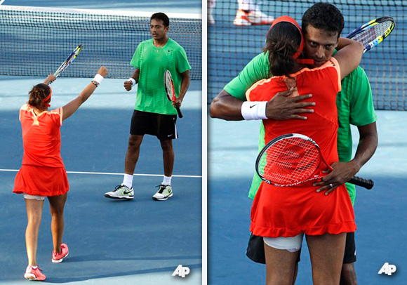 India's Sania Mirza, left, and Mahesh Bhupathi celebrate after defeating Iveta Benesova of the Czech Republic and Jurgen Melzer of Austria during their second round mixed doubles match at the Australian Open tennis championship, in Melbourne, Australia, Monday, Jan. 23, 2012. (AP Photo/Sarah Ivey)