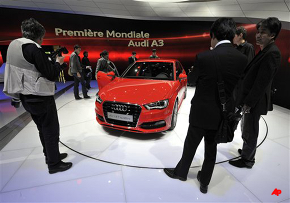 The new Audi A3 car is shown during the press day at the Geneva International Motor Show in Geneva, Switzerland, Tuesday, March 6, 2012. The Motor Show will open its gates to the public from March 8 to 18, presenting more than 260 exhibitors and more than 180 world and European premieres. (AP Photo/Keystone, Martial Trezzini)