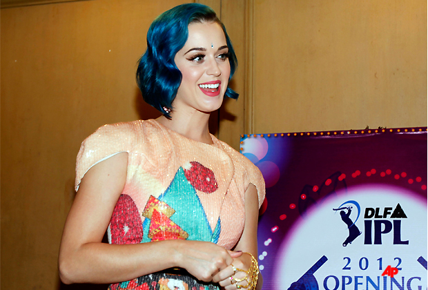 U.S. singer Katy Perry smiles during a photo opportunity before her performance at the Indian Premier League (IPL) opening ceremony in Chennai, India, Tuesday, April 3, 2012. The IPL 2012 will feature 76 games of short format cricket across 12 venues in India starting April 4. (AP Photo/Aijaz Rahi)