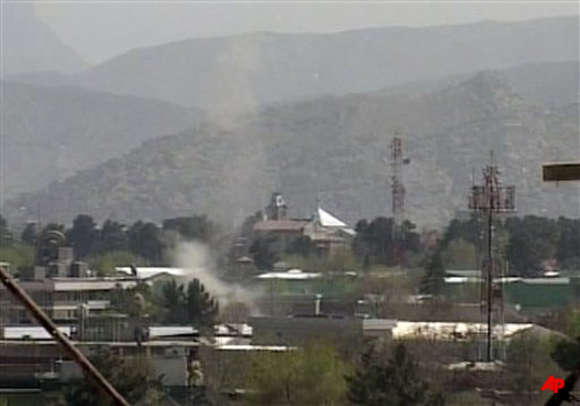 In this image taken from video, showing smoke rising from Kabul, Afghanistan, following attacks by Taliban militants Sunday April 15, 2012. Militants launched a series of coordinated attacks in the Afghan capital Sunday, with blasts and gunfire rocking three neighborhoods that are home to Afghan government buildings, Western embassies and NATO bases. (AP Photo/AP Video)