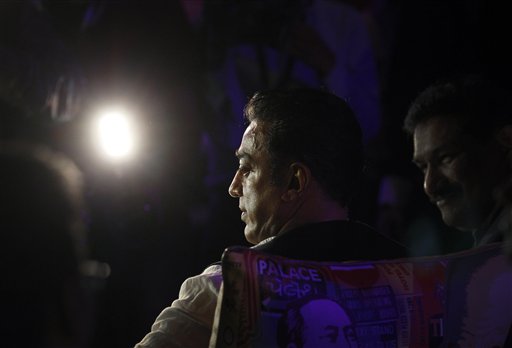 Indian Bollywood actor and director Kamal Haasan waits for a press conference about his latest movie Vishwaroop as part of the three day long International Indian Film Academy (IIFA) awards Friday June 8, 2012 in Singapore.