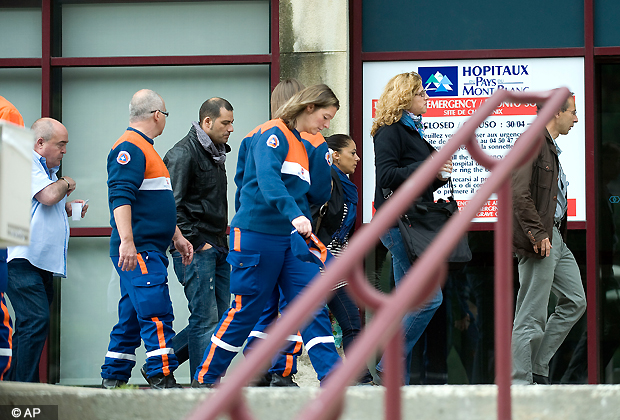 Relatives of the victims of the avalanche enters the hospital near Chamonix, France, Friday, July 13, 2012. An avalanche in the French Alps swept Thursday nine climbers to their deaths on a slope leading to Mont Blanc. Three Britons, three Germans, two Spaniards and a Swiss climber were killed, and 14 people were injured in Thursday's accident below the summit of Western Europe's highest peak. (AP Photo)