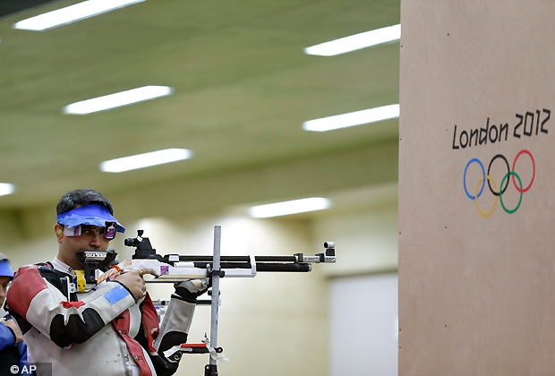 India's Gagan Narang shoots during qualifiers for the men's 10 meter air rifle event at the 2012 Summer Olympics, Monday, July 30, 2012, in London. (AP Photo)