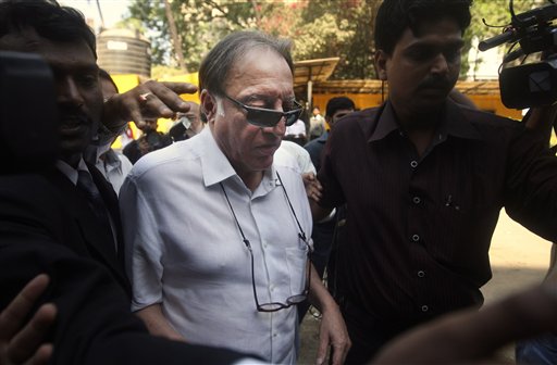 Former Indian cricket captain Mansoor Ali Khan Pataudi, center, arrives at a governing council meeting of the IPL cricket league in Mumbai, India, Monday, April 26, 2010. The Indian Premier League's governing council Monday appointed cricket board vice president Chirayu Amin as IPL's interim chairman in place of suspended chief Lalit Modi, who is facing an inquiry over allegations of corruption.(AP Photo/Rafiq Maqbool)