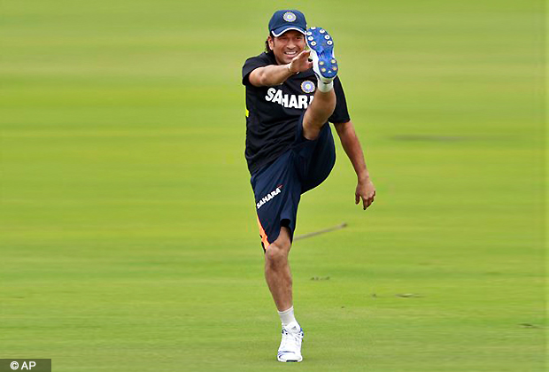 Indian cricket player Sachin Tendulkar warms up during a practice session in Hyderabad, India, Sunday, Aug. 19, 2012. New Zealand and India play the first of their two test cricket series beginning Aug. 23 in Hyderabad. (AP Photo)