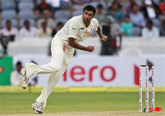 Indian cricketer Ravichandran Ashwin bowls during the second day of the first cricket test match against New Zealand in Hyderabad, India, Friday, Aug. 24, 2012. (AP Photo/Mahesh Kumar A.)