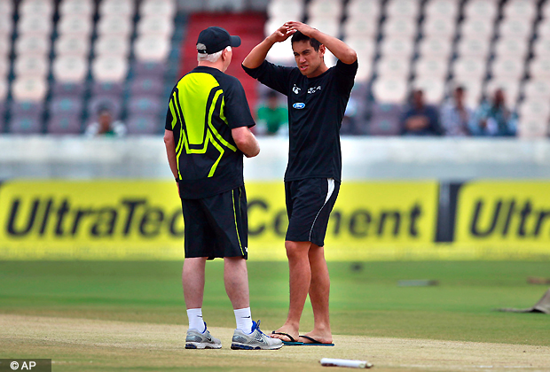 New Zealand's captain Ross Taylor, right, talks to Indian team coach Duncan Fletcher after checking the pitch before the start of play on fourth day of their first cricket test match in Hyderabad, India, Sunday, Aug. 26, 2012. (AP Photo/Mahesh Kumar A.)