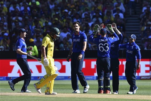 Australia's Aaron Finch 2nd left, walks past as England's team celebrates running him out during their Cricket World Cup pool A match in Melbourne, Australia, Saturday, Feb. 14, 2015.