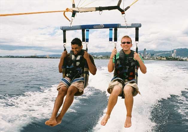 The happy couple enjoying water sports at their honeymoon.