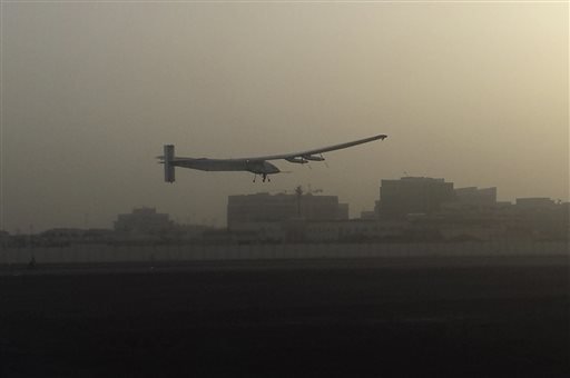 A Swiss solar powered plane takes off at an airport in Abu Dhabi, United Arab Emirates, early Monday, March 9, 2015, marking the start of the first attempt to fly around the world without a drop of fuel. Solar Impulse founder Andre Borschberg was at the controls of the single seater when it took off from the Al Bateen Executive Airport. Borschberg will trade off piloting with Solar Impulse co founder Bertrand Piccard during stop overs on a journey that will take months to complete. (AP Photo)
