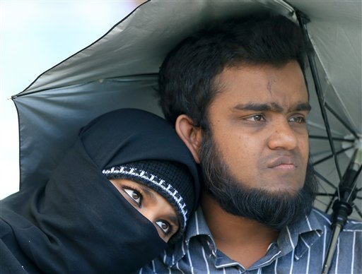 Spectators watch the Cricket World Cup Pool A match between England and Bangladesh in Adelaide, Australia, Monday, March 9, 2015. (AP Photo)