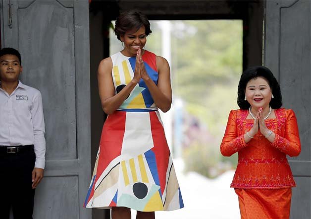 U.S. first lady Michelle Obama and Bun Rany, the first lady of Cambodia arrive to meet with students at a local high school on the outskirts of Siem Reap, Cambodia.